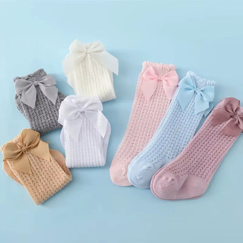 Princess Touch: Bow-Embellished Cotton Knee Socks for Baby Girls